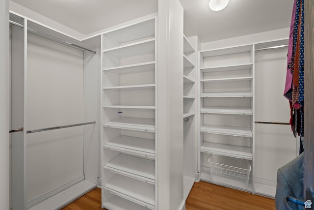 6033 S 2300 E, Holladay, UT 84121 - walk in closet featuring wood finished floors