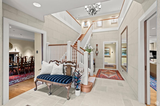 6033 S 2300 E, Holladay, UT 84121 - entryway featuring ornamental molding, stairway, a chandelier, and recessed lighting