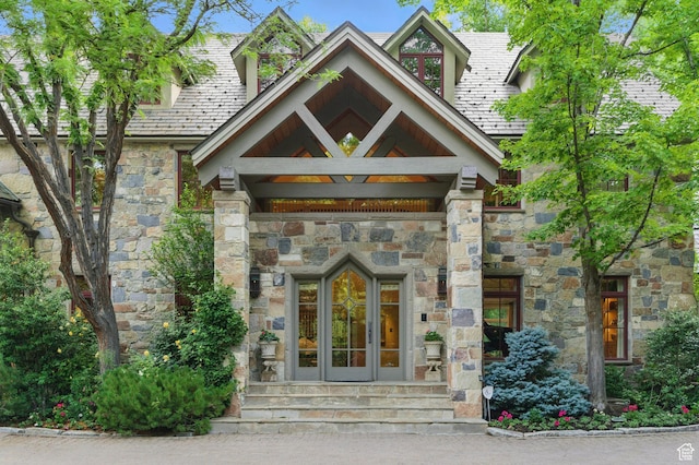 6033 S 2300 E, Holladay, UT 84121 - doorway to property with stone siding and french doors