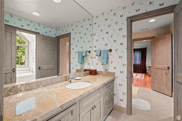 6033 S 2300 E, Holladay, UT 84121 - bathroom with wallpapered walls, vanity, and tile patterned floors