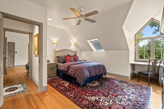 6033 S 2300 E, Holladay, UT 84121 - bedroom with lofted ceiling, light wood-style flooring, and a ceiling fan