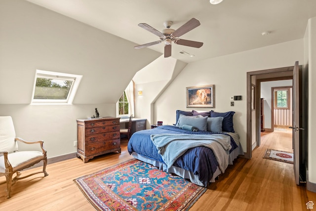6033 S 2300 E, Holladay, UT 84121 - bedroom featuring light wood-style floors, multiple windows, a ceiling fan, and lofted ceiling