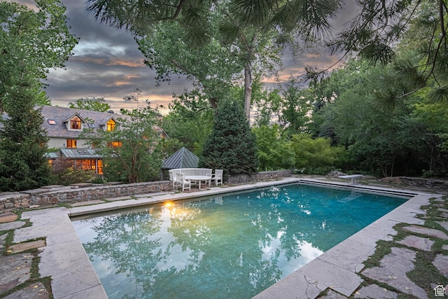 6033 S 2300 E, Holladay, UT 84121 - swimming pool with a patio area and a diving board