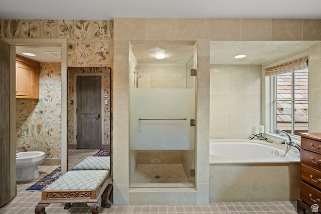 6033 S 2300 E, Holladay, UT 84121 - bathroom featuring a shower stall, a bidet, a garden tub, and tile patterned floors