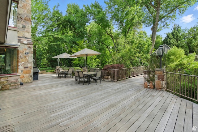 6033 S 2300 E, Holladay, UT 84121 - wooden terrace featuring outdoor dining space and view of scattered trees