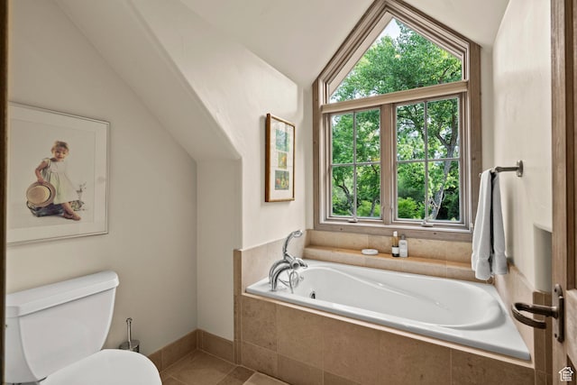 6033 S 2300 E, Holladay, UT 84121 - bathroom featuring lofted ceiling, a garden tub, and tile patterned flooring
