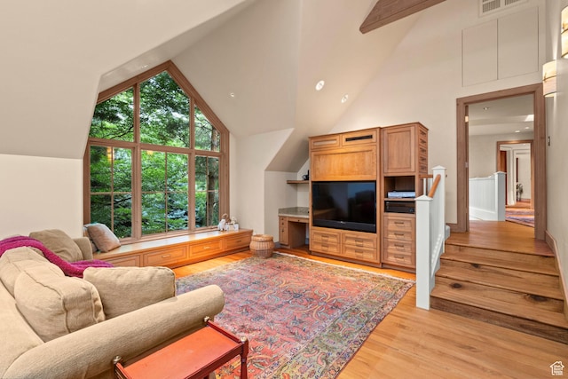 6033 S 2300 E, Holladay, UT 84121 - living room with lofted ceiling and light wood-style floors