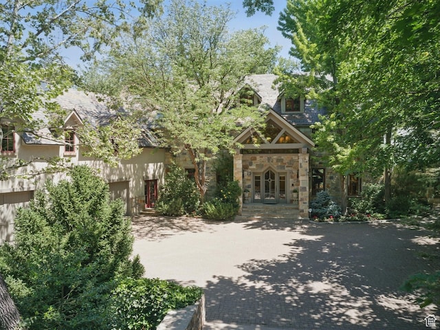 6033 S 2300 E, Holladay, UT 84121 - view of front of house with decorative driveway and stone siding