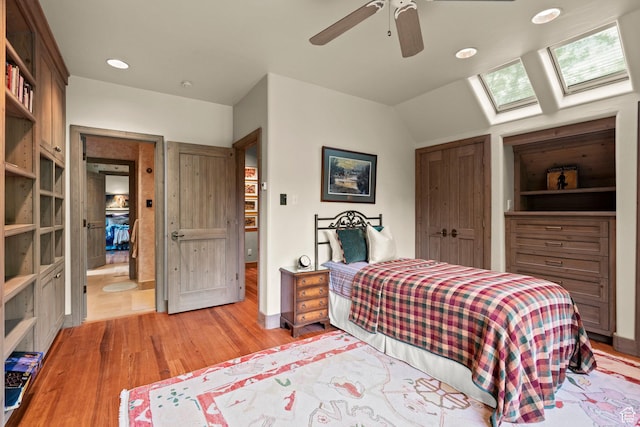 6033 S 2300 E, Holladay, UT 84121 - bedroom with a skylight, light wood finished floors, a ceiling fan, recessed lighting, and lofted ceiling