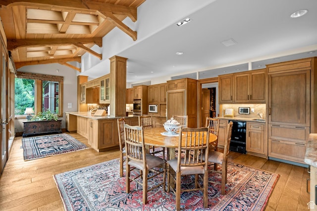 6033 S 2300 E, Holladay, UT 84121 - dining space with wine cooler, light wood-style flooring, wooden ceiling, and recessed lighting