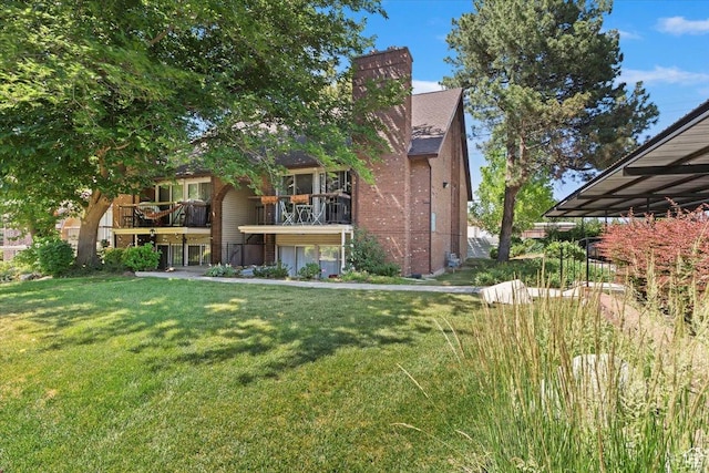 1263 E Cottonwood Hills Dr S, Sandy, UT 84094 - exterior space featuring a balcony, a lawn, a chimney, and brick siding