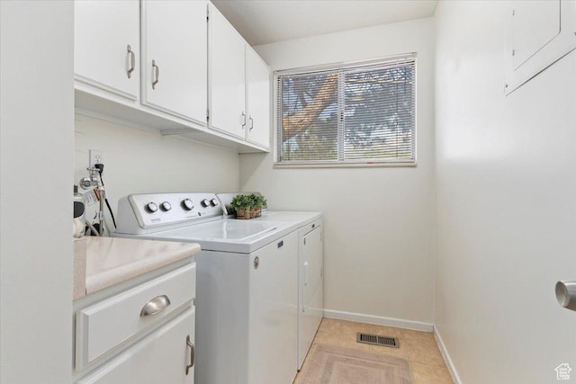 1263 E Cottonwood Hills Dr S, Sandy, UT 84094 - laundry area featuring separate washer and dryer, cabinet space, electric panel, and light tile patterned floors
