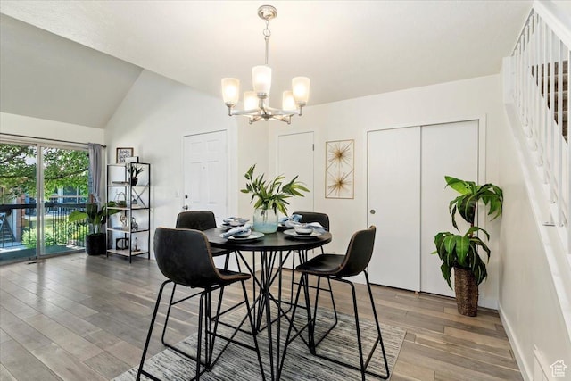 1263 E Cottonwood Hills Dr S, Sandy, UT 84094 - dining room featuring a chandelier, wood finished floors, lofted ceiling, and stairs