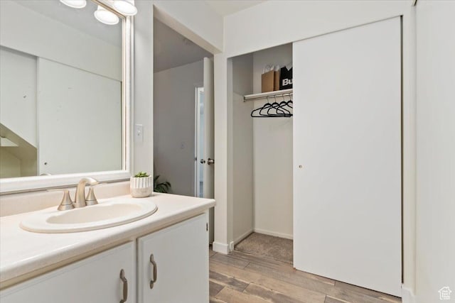 1263 E Cottonwood Hills Dr S, Sandy, UT 84094 - bathroom featuring wood finished floors and vanity