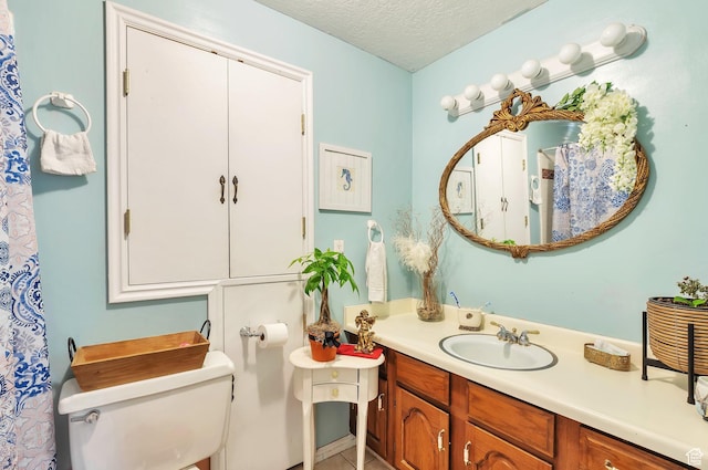 1162 N Newport Ln E, Kaysville, UT 84037 - bathroom featuring vanity and a textured ceiling