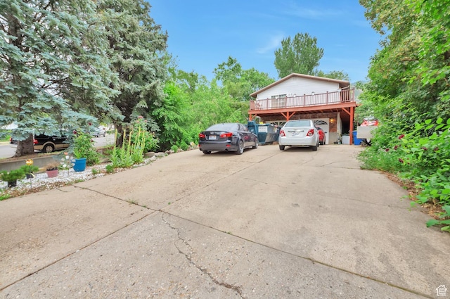 1162 N Newport Ln E, Kaysville, UT 84037 - view of parking / parking lot with driveway and a carport