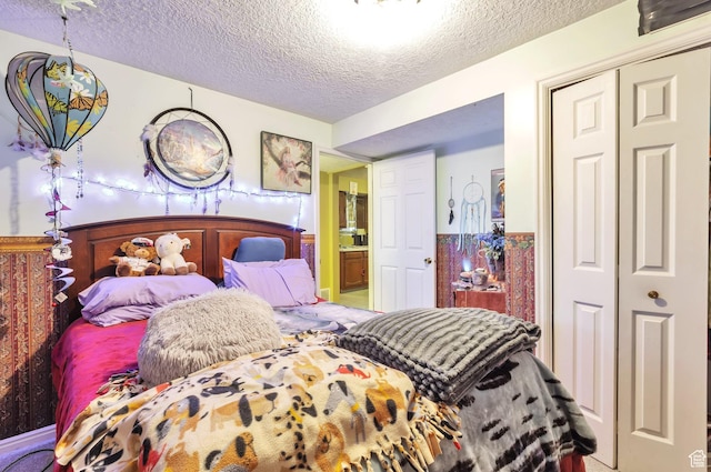 1162 N Newport Ln E, Kaysville, UT 84037 - bedroom with a textured ceiling and a closet