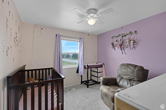 3684 W 4625 S, Roy, UT 84067 - bedroom with light colored carpet, ceiling fan, and a textured ceiling