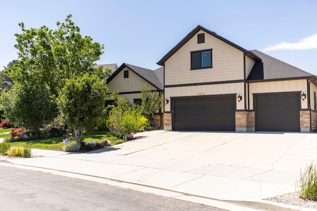9532 S Willow Trail Way S, Jordan, UT 84095 - view of front of property with driveway, a garage, an attached garage, and board and batten siding