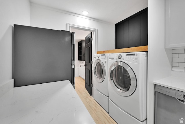 3990 Summer Ridge Rd, Morgan, UT 84050 - washroom featuring separate washer and dryer and light wood-style flooring