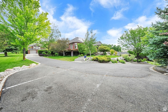 3990 Summer Ridge Rd, Morgan, UT 84050 - view of front facade featuring a front lawn and uncovered parking