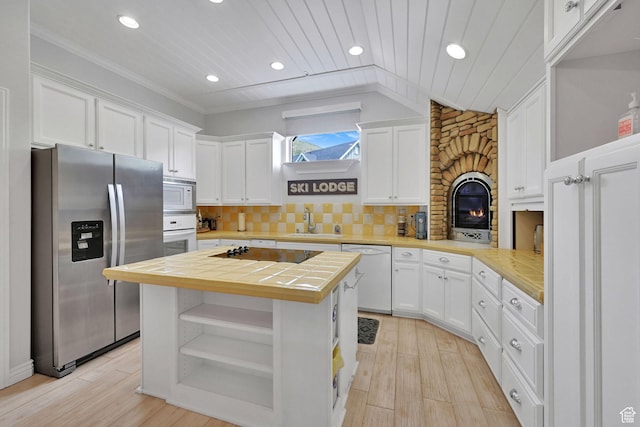 3990 Summer Ridge Rd, Morgan, UT 84050 - kitchen featuring white appliances, white cabinetry, open shelves, recessed lighting, and tile countertops