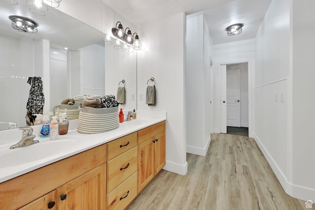 3990 Summer Ridge Rd, Morgan, UT 84050 - full bathroom featuring wood finished floors and double vanity