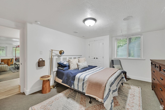 3990 Summer Ridge Rd, Morgan, UT 84050 - carpeted bedroom featuring baseboards and a textured ceiling