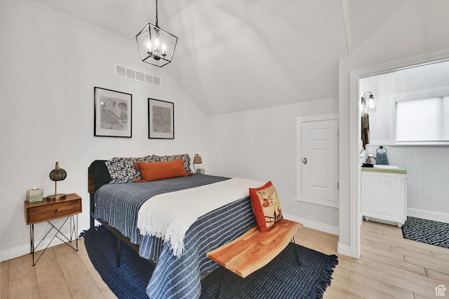 3990 Summer Ridge Rd, Morgan, UT 84050 - bedroom with wood finished floors, vaulted ceiling, and a chandelier