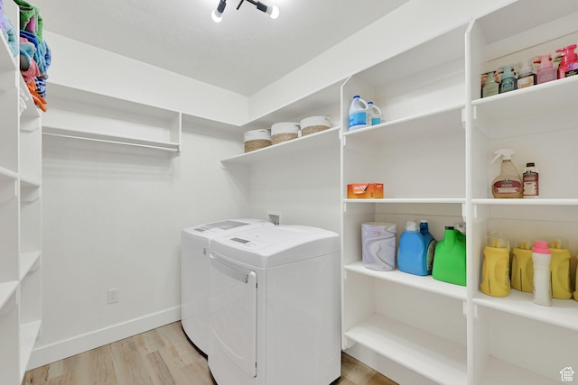 3990 Summer Ridge Rd, Morgan, UT 84050 - washroom with washing machine and clothes dryer and light wood finished floors