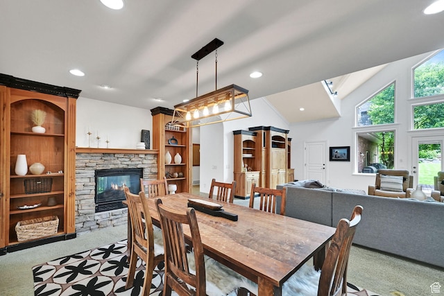 3990 Summer Ridge Rd, Morgan, UT 84050 - dining room with healthy amount of natural light, carpet flooring, a stone fireplace, recessed lighting, and lofted ceiling