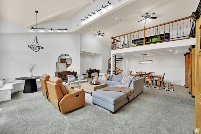 3990 Summer Ridge Rd, Morgan, UT 84050 - carpeted living room featuring ceiling fan, stairs, high vaulted ceiling, and recessed lighting