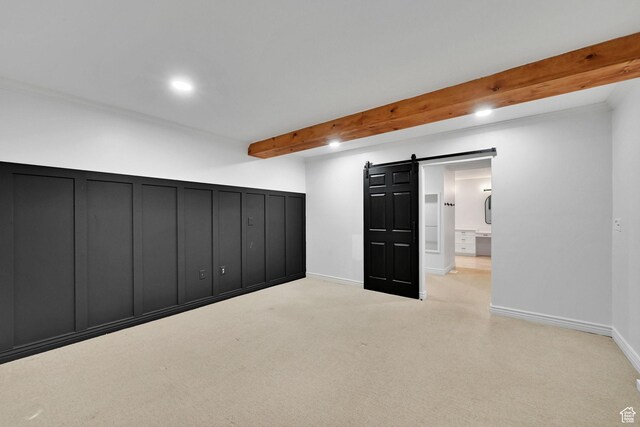 3990 Summer Ridge Rd, Morgan, UT 84050 - below grade area with a barn door, carpet flooring, and recessed lighting