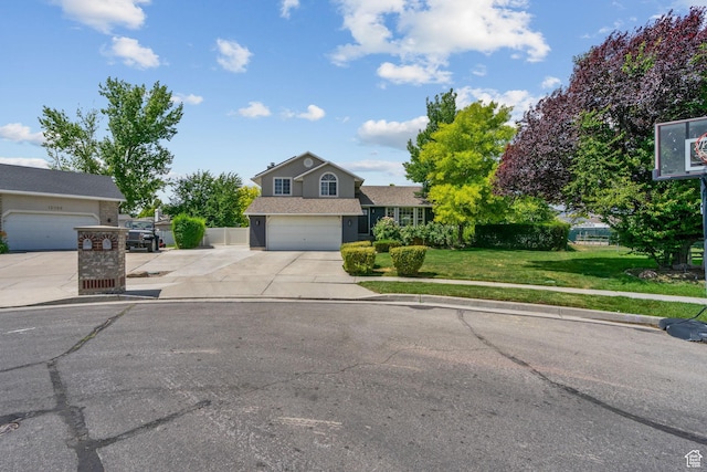 13082 S 2770th Cir W, Riverton, UT 84065 - view of front of home with concrete driveway, a garage, and a front yard
