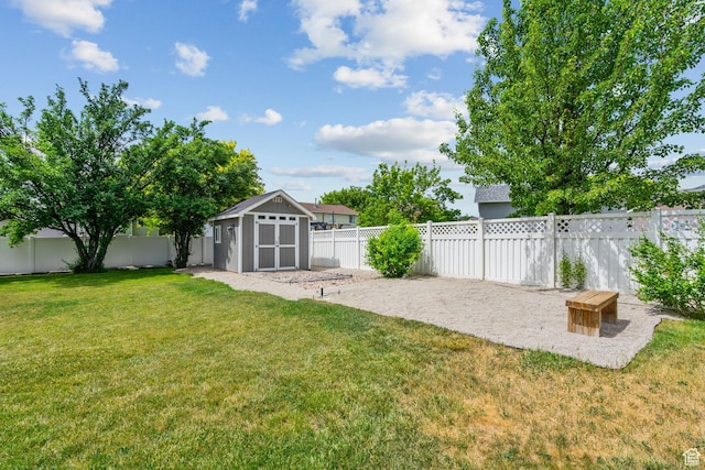 13082 S 2770th Cir W, Riverton, UT 84065 - fenced backyard featuring a storage shed and a patio