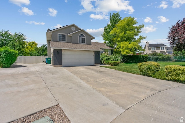 13082 S 2770th Cir W, Riverton, UT 84065 - traditional-style home featuring concrete driveway, an attached garage, and stucco siding