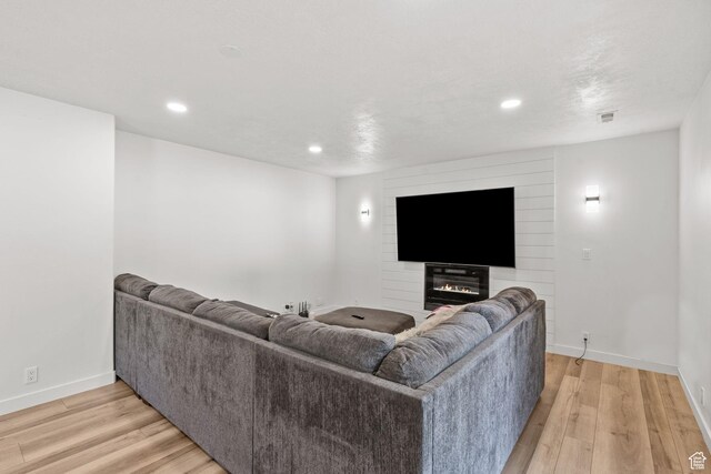 13082 S 2770th Cir W, Riverton, UT 84065 - living room featuring light wood-style flooring and recessed lighting
