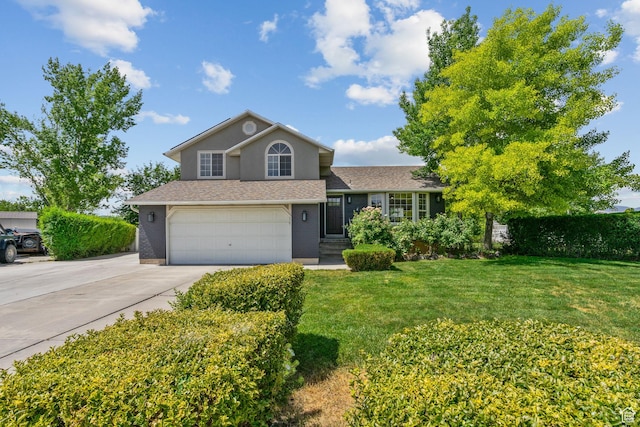 13082 S 2770th Cir W, Riverton, UT 84065 - view of front of house with concrete driveway, a garage, a front lawn, and stucco siding
