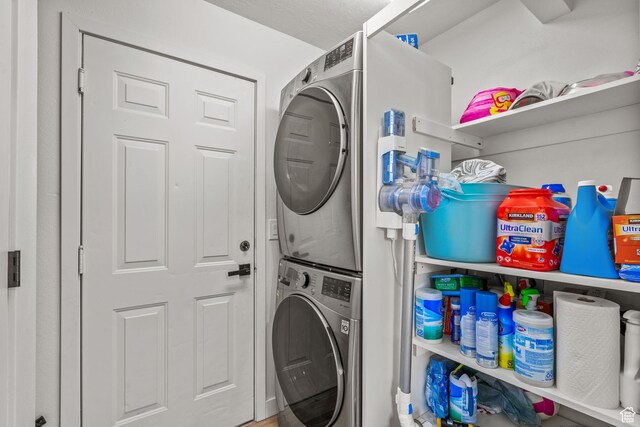 13082 S 2770th Cir W, Riverton, UT 84065 - washroom featuring stacked washer / dryer