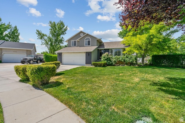 13082 S 2770th Cir W, Riverton, UT 84065 - view of front of property with driveway and stucco siding