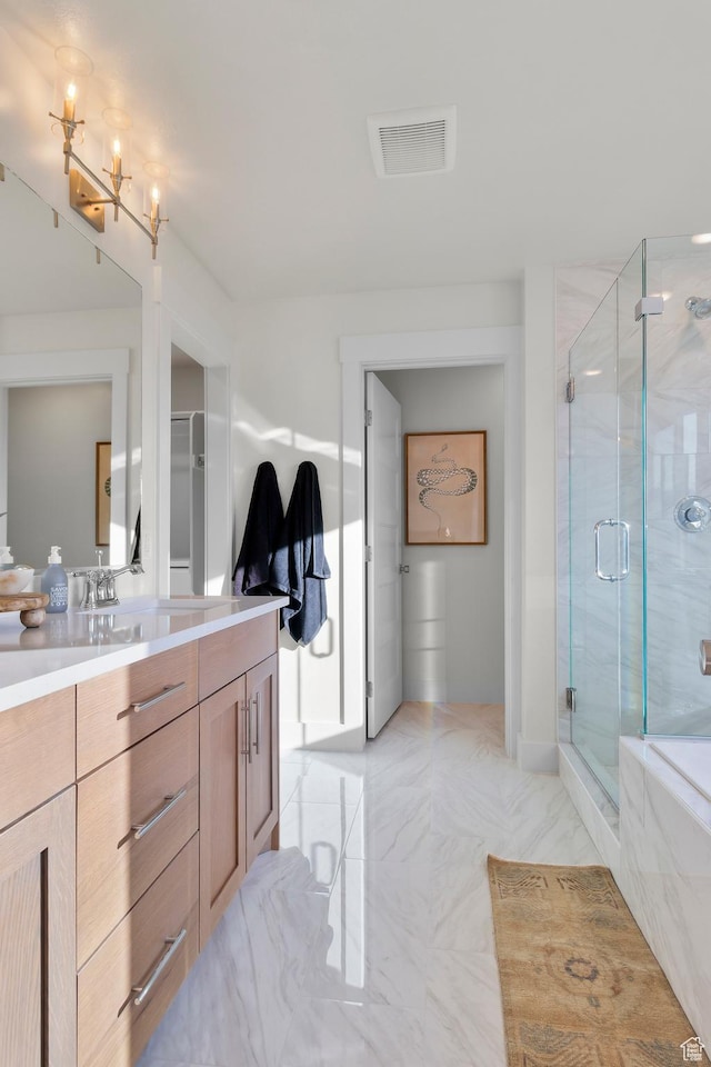 635 E 240 N Unit 9, Tremonton, UT 84337 - bathroom with vanity, a stall shower, marble finish floors, and a chandelier