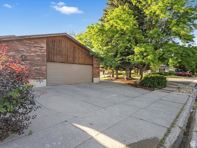 1411 E 1220 N, Logan, UT 84341 - garage with concrete driveway
