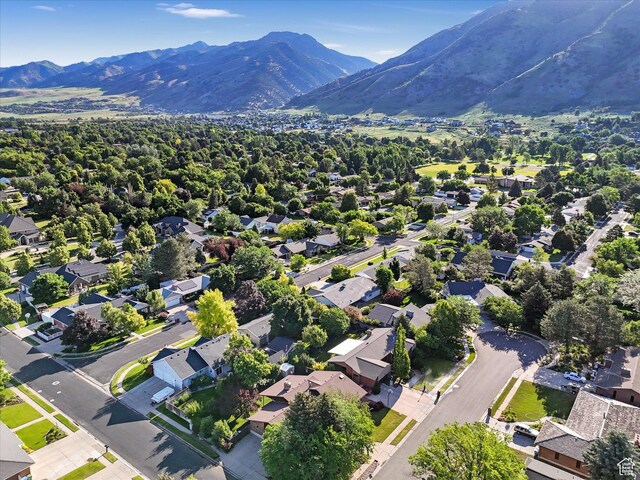 1411 E 1220 N, Logan, UT 84341 - aerial view of residential area with a mountain backdrop