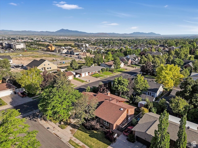 1411 E 1220 N, Logan, UT 84341 - aerial view of residential area featuring mountains