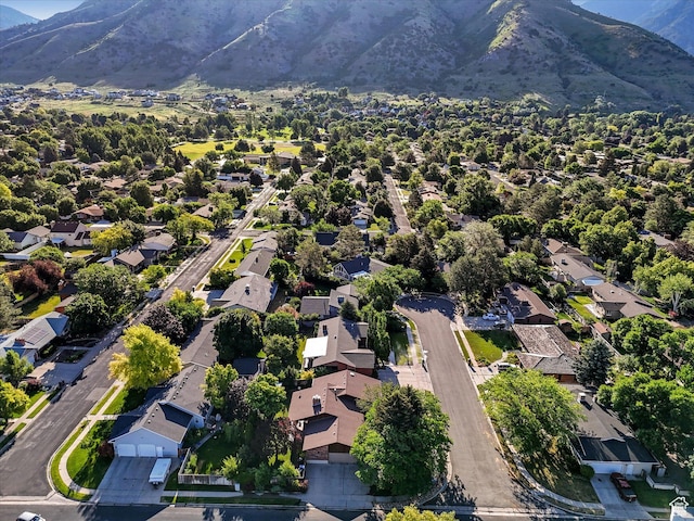 1411 E 1220 N, Logan, UT 84341 - aerial perspective of suburban area with a mountainous background