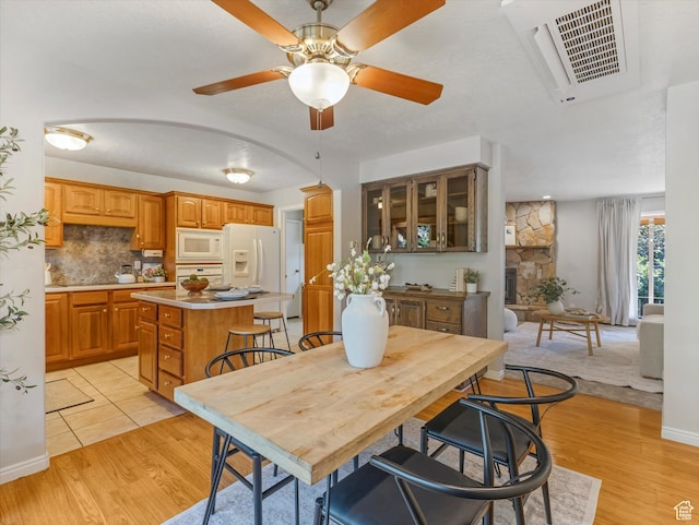 1411 E 1220 N, Logan, UT 84341 - dining area with ceiling fan and light wood finished floors