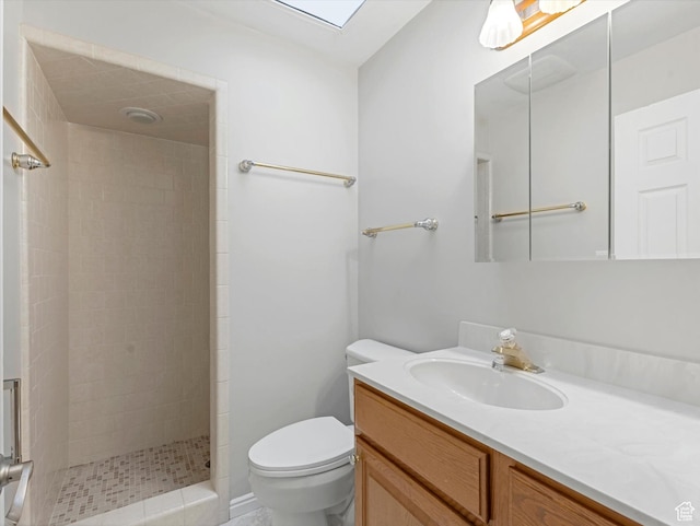 1411 E 1220 N, Logan, UT 84341 - bathroom with vanity, a tile shower, and a skylight