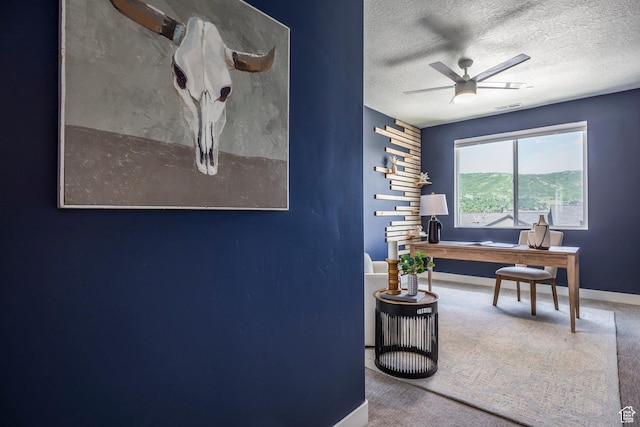 3249 Quarry Springs Dr, Park City, UT 84098 - hall with carpet floors, a desk, and a textured ceiling