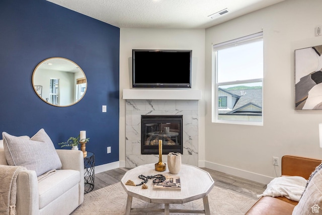 3249 Quarry Springs Dr, Park City, UT 84098 - living area featuring a high end fireplace and wood finished floors