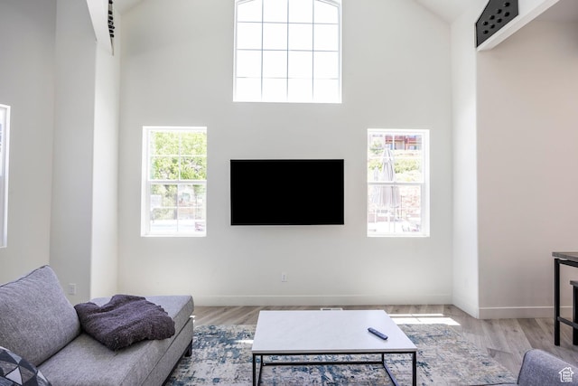 3249 Quarry Springs Dr, Park City, UT 84098 - living area featuring high vaulted ceiling and wood finished floors